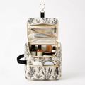 Botanical hanging toiletry bag white background